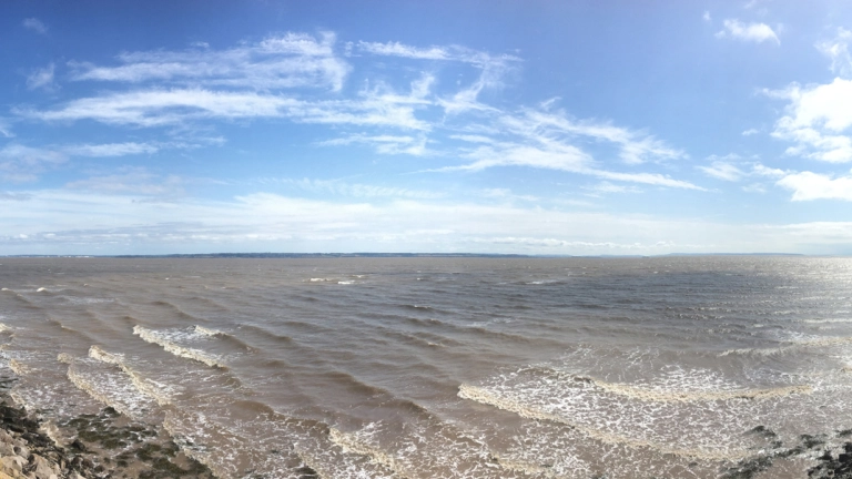 A beach at high tide.