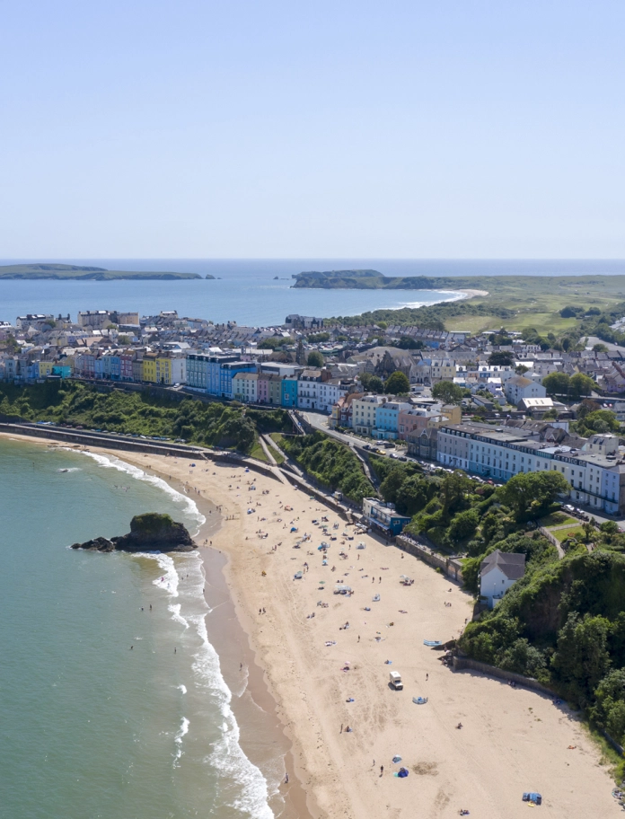 Aerial view of beach and town.