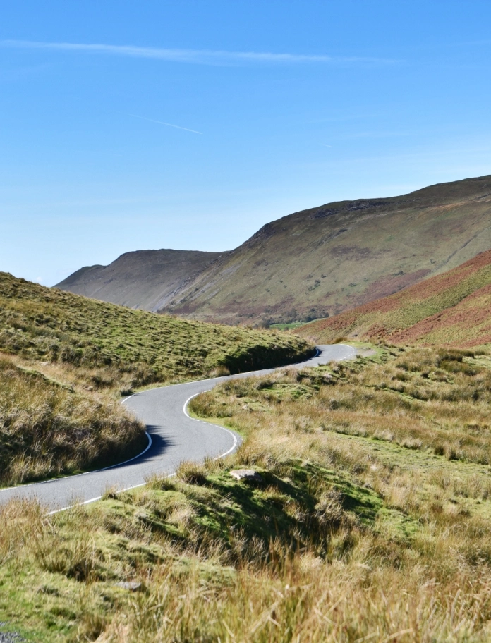 A windy road through the mountains.
