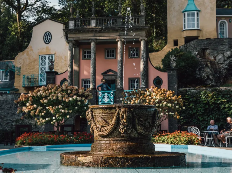 Ornate sculpture and pool in Italianate village/