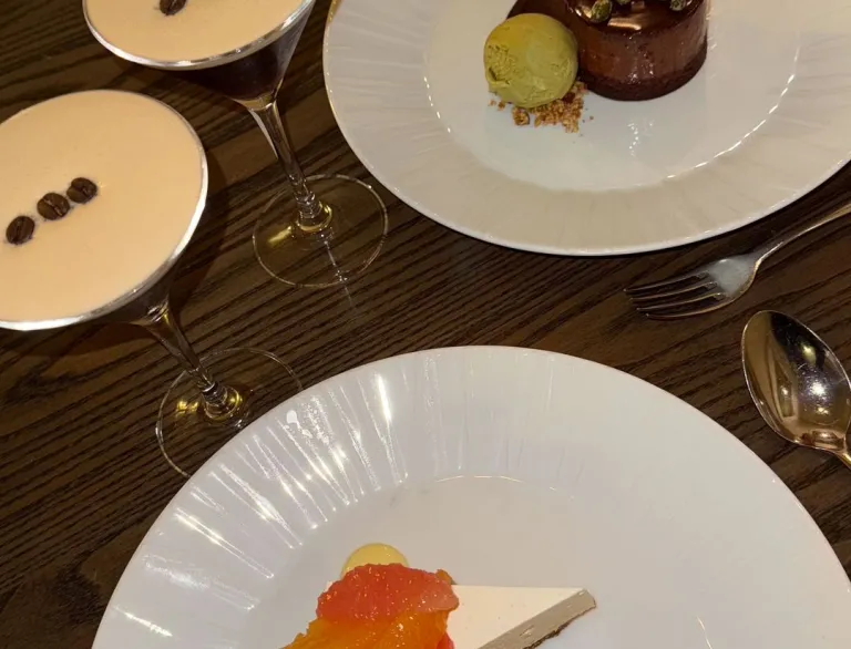 Plates of food on table.