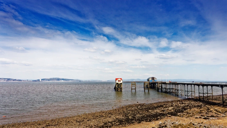 A pier jutting out into the sea.