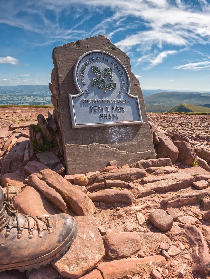 Walker on summit of Pen y Fan (886m).