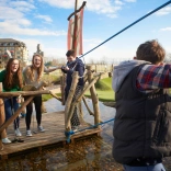 Family on a raft at the adventure golf course at Celtic Manor Resort.