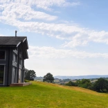 A luxury lodge overlooking countryside.